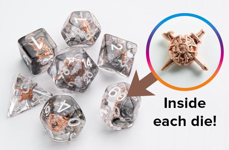An overhead photo of seven Embraced Dice from Gamegenic, and a close up of a shield tokens with crossed swords behind it that is embedded in the center of each die.