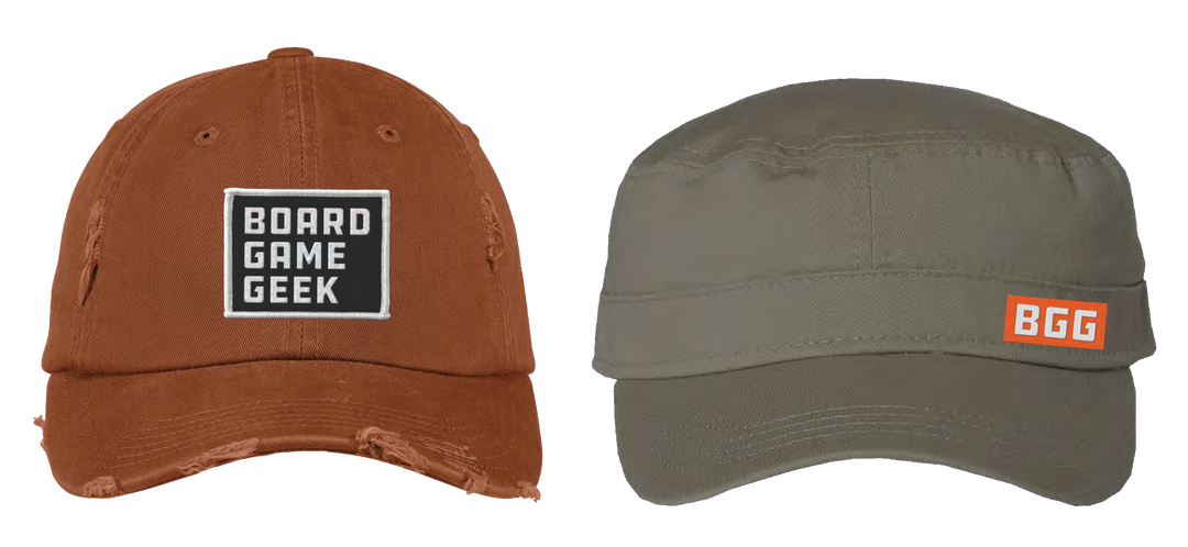 Two caps, side by side. One is burnt orange with intentional distressing and a black-and-white patch that says "BoardGameGeek" in the front center. The second hat is olive green and has a small orange and white label on the right side that says "BGG".