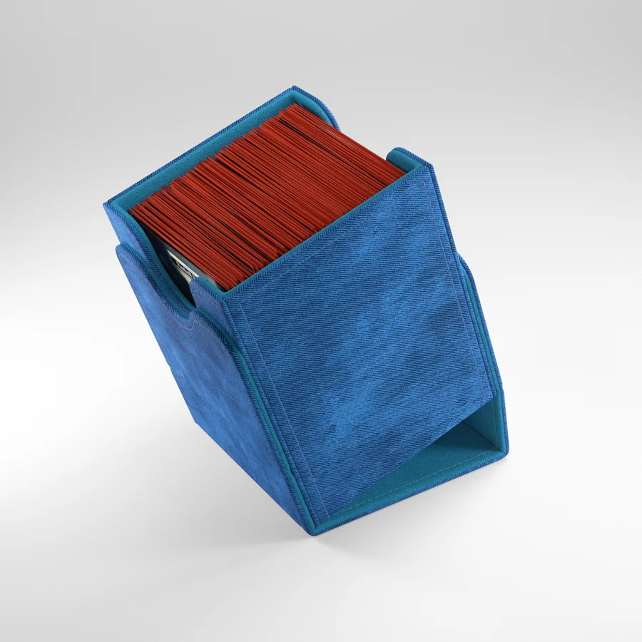 A photo of a blue, fabric box on a white background. The open box is filled with cards and sitting at a slight angle, with the lid serving as a base.