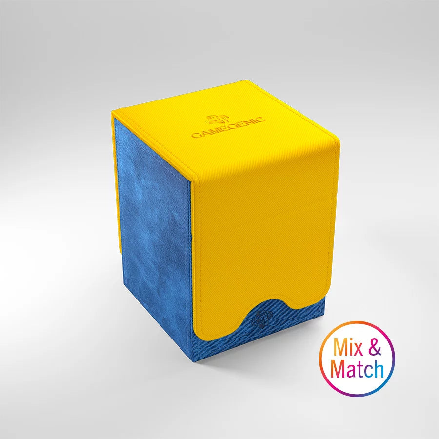 A photo of a blue, fabric box with a yellow lid on a white background. The the lid closed and the label "Mix & Match" is printing in the lower right corner.