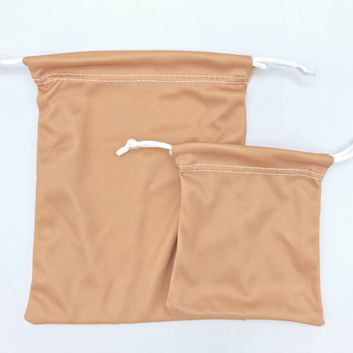 Microfiber Drawstring Bags for use with the board game REORDER, sold at the BoardGameGeek Store