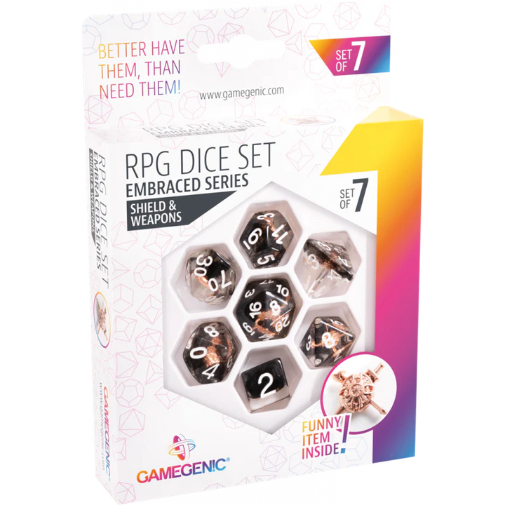A photo of a front cover of a box of Shield & Weapon Embraced Dice by Gamegenic, with all seven dice visible through a clear window in the front of the packaging.