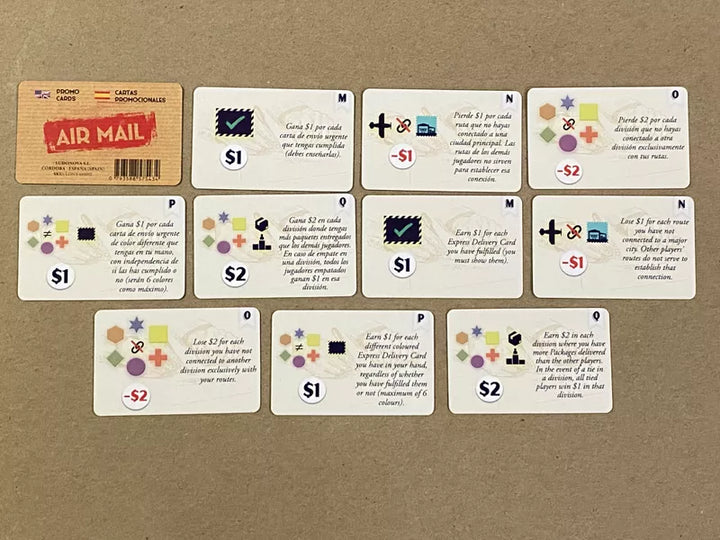 A set of 11 promo cards for use with the board game Airmail. One card displays the name of the game and the title of the promo. The other 10 cards display a collection of symbols on the left side and a description of the card's affect in the game on the right. Five cards have the text in English and the other five cards have identical symbols with the text in Spanish.