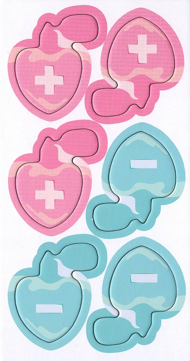 An overhead view of a cardboard punchboard for use with the board game Bites. The punchboard features six identical heart-shaped perfume containers. Three are pink with a plus sign in the middle, and three are light blue with a negative sign in the middle.