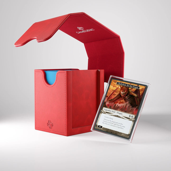 A photo of a red, fabric box on a white background. The box is filled with cards and one card is floating to the side of box, after being removed from an insert slot on the side. The lid is removed and floating in midair above the box.