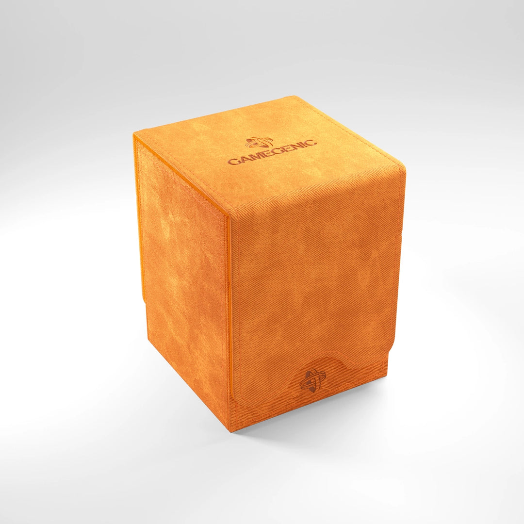 A photo of a orange, fabric box on a white background, with the lid closed.