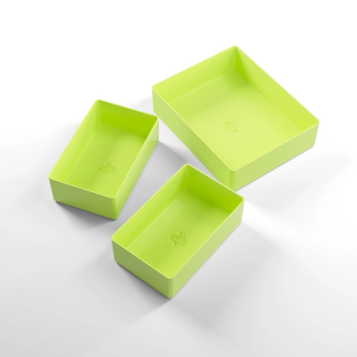 A photo of three, lime green, plastic containers, two small and one large, on a white background.