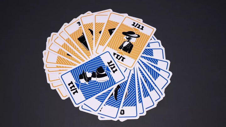 A photo of circle of cards from the board game Kompromat. All cards display a black and white stylized illustration of a person and the numbers 1/11 at the top and bottom. The background color of half of the cards is orange and the background color of the other half is blue.