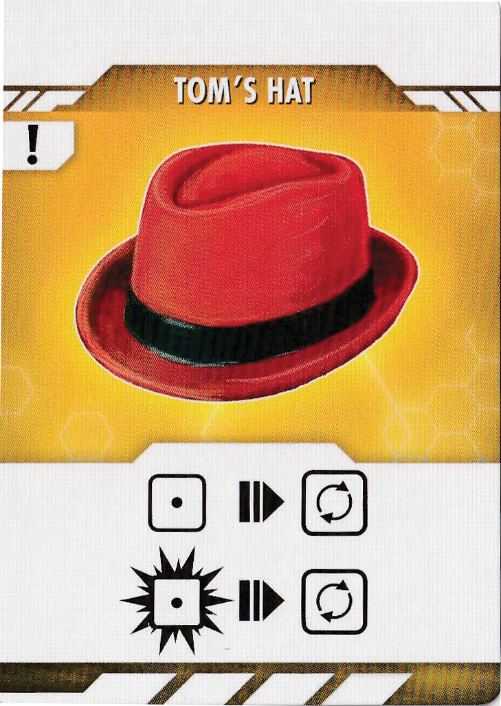 A single card for use with the board game Reload, featuring a card labeled "Tom's Hat" at the top, an illustration of a red fedora hat on a yellow background in the middle, and symbols that describe the card's ability in the game at the bottom.
