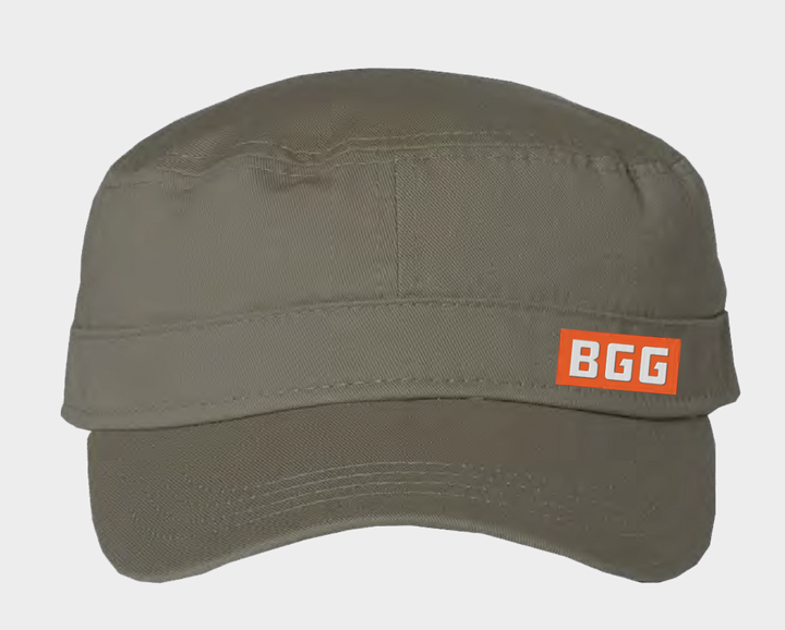 A fidel cap that is olive green and has a small orange and white label on the right side that says "BGG".