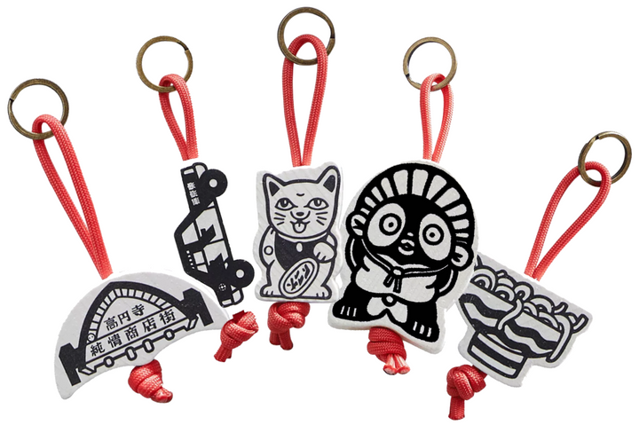Little Tokyo: Pendant Charms for use with the board game Little Tokyo, sold at the BoardGameGeek Store