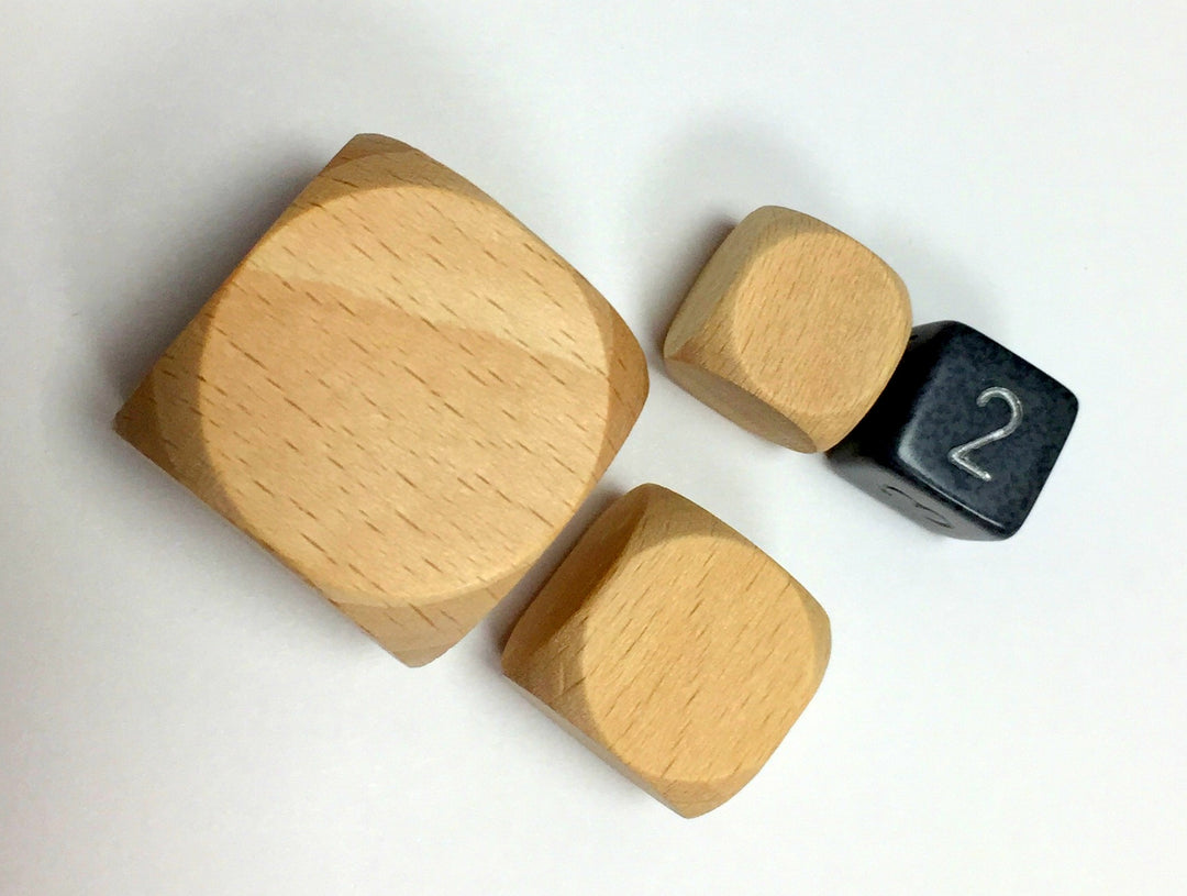 Blank Wooden Dice: Three Sizes for use with the board game Spring Sale, sold at the BoardGameGeek Store