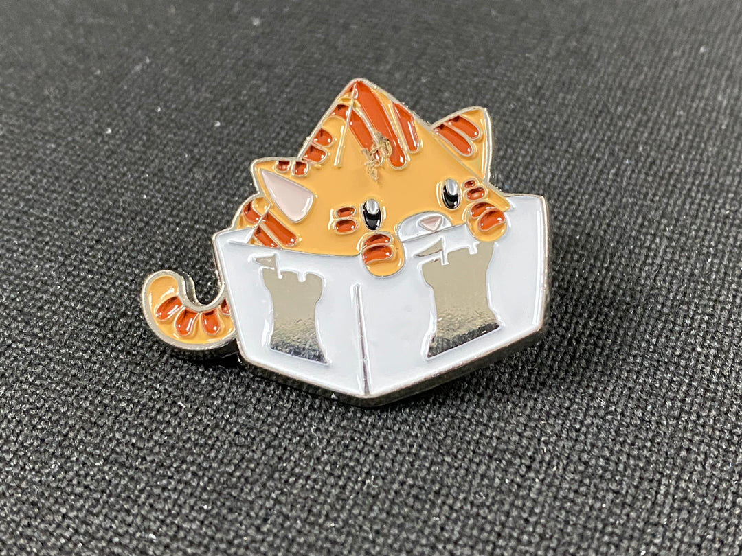 The Dice Tower: Enamel Pins for use with the board game The Dice Tower, sold at the BoardGameGeek Store