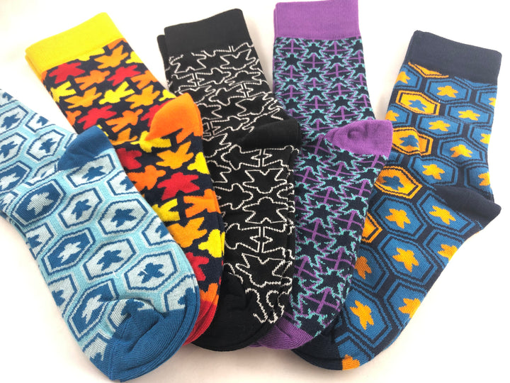 Mr. Meeple Board Game Socks for use with the board game , sold at the BoardGameGeek Store