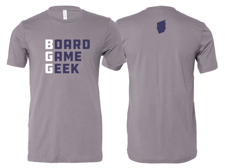 A picture of the front and back of a gray t-shirt. On the front, the shirt is printed with the words "BoardGameGeek", with "BGG" in white letters and the rest in dark purple letters. On the back, the BoardGameGeek logo is pictured in dark purple on the upper center on the shirt.