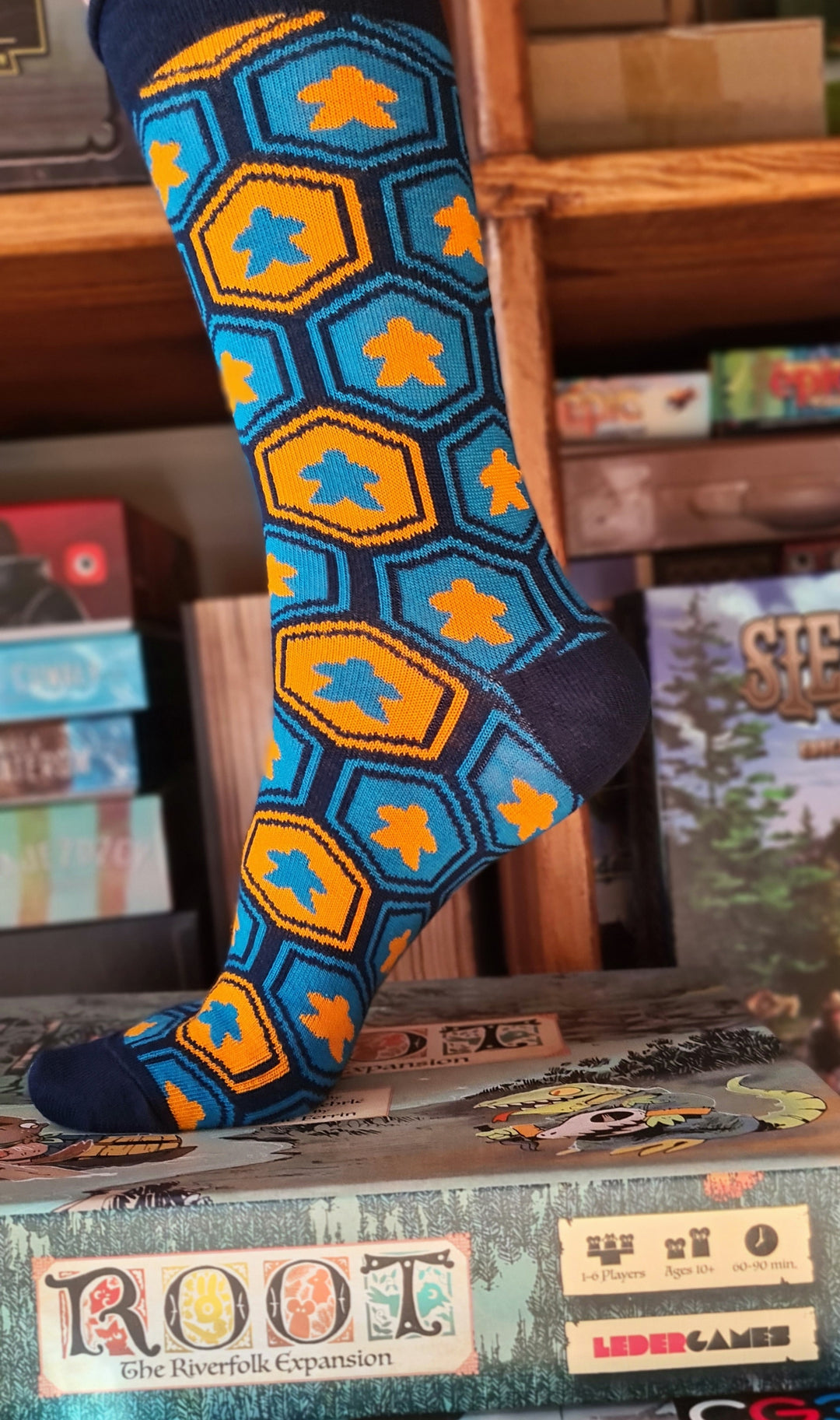 Mr. Meeple Board Game Socks for use with the board game , sold at the BoardGameGeek Store