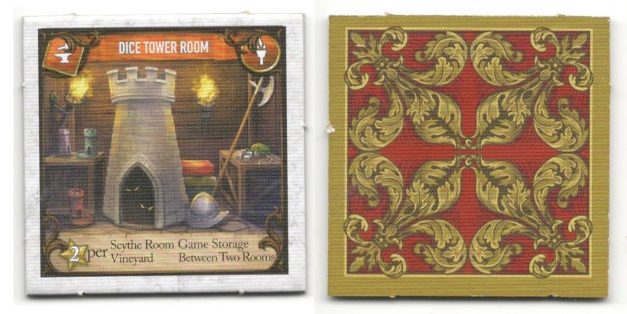 The front and back of the Dice Tower Room promo tile, for use with the game Between Two Castles of Mad King Ludwig. The front of the tile shows a cluttered storage space, dominating by a large castle tower with glowing eyes peering out. The back of the tile is a red background with a gold fleur de lis shape in each quadrant. 